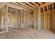 Interior of a home under construction with exposed wood framing, showing layout and awaiting further development at 2605 Hazelwood Dr, Raleigh, NC 27608