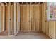 Interior of unfinished room showing framing and the beginning of construction at 2605 Hazelwood Dr, Raleigh, NC 27608