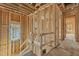 Stairway construction with wooden framing showcases the home's layout and design at 2605 Hazelwood Dr, Raleigh, NC 27608