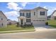 Charming two-story home with a two-car garage, well-maintained lawn, and inviting curb appeal at 279 Providence Creek Dr, Fuquay Varina, NC 27526