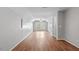 Open bonus room with hardwood floors, recessed lighting, a ceiling fan and natural light from the window at 2909 Timpani Trl, Apex, NC 27539