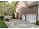 Spacious two-car garage with an adjacent boat parking area at 2909 Timpani Trl, Apex, NC 27539