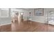 Spacious living room with hardwood floors and classic wall trim at 2909 Timpani Trl, Apex, NC 27539
