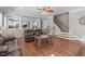 Inviting open-concept living room with a view of the kitchen and staircase at 2909 Timpani Trl, Apex, NC 27539