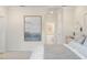 Serene bedroom featuring a tray ceiling, plush carpet, and a decorative painting for a cozy atmosphere at 293 Providence Creek Dr, Fuquay Varina, NC 27526