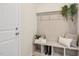 Entryway with a built-in bench, storage cubbies, and stylish decor for organization at 293 Providence Creek Dr, Fuquay Varina, NC 27526