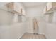 Neat walk-in closet with shelving and racks at 293 Providence Creek Dr, Fuquay Varina, NC 27526