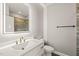 This bathroom features a white vanity, an LED mirror, and a shower with gray marble style tiles at 2936 Turning Brook Ln, Raleigh, NC 27616