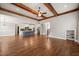 Open-concept living space with hardwood floors leads to the kitchen and stairwell at 2936 Turning Brook Ln, Raleigh, NC 27616