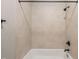 Shower showcasing tiled walls, a showerhead, and sleek fixtures for a modern look at 2936 Turning Brook Ln, Raleigh, NC 27616