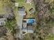Beautiful property with mature trees features a pool, deck, garage, and a well-maintained home at 2949 Tram Rd, Fuquay Varina, NC 27526