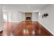 Finished basement featuring hardwood floors and a cozy fireplace with stone surround at 2949 Tram Rd, Fuquay Varina, NC 27526
