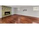 Finished basement features hardwood floors and a cozy fireplace at 2949 Tram Rd, Fuquay Varina, NC 27526
