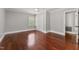 Bedroom features hardwood floors, closet, and natural light at 2949 Tram Rd, Fuquay Varina, NC 27526