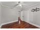 This bedroom has hardwood floors, a ceiling fan, closet, and tv hookups at 2949 Tram Rd, Fuquay Varina, NC 27526
