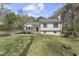 Beautiful home with a manicured lawn, a charming front door, and well-maintained landscaping at 2949 Tram Rd, Fuquay Varina, NC 27526
