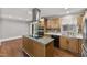 Well-appointed kitchen featuring modern appliances and custom backsplash at 2949 Tram Rd, Fuquay Varina, NC 27526