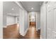 Spacious living room showcasing hardwood floors and neutral paint at 2949 Tram Rd, Fuquay Varina, NC 27526