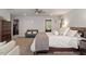 Bright primary bedroom with sitting area, walk-in closet, and large windows at 302 Rutherglen Dr, Cary, NC 27511