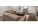 Comfortable living room with plush sofas, a decorative rug, and a modern entertainment setup at 302 Rutherglen Dr, Cary, NC 27511