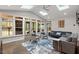 Sun-filled living room with skylights and french doors to outdoor spaces at 302 Rutherglen Dr, Cary, NC 27511