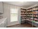 Walk-in pantry with ample shelving and organized storage solutions at 302 Rutherglen Dr, Cary, NC 27511