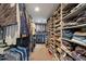 Extensive walk-in closet with custom shelving and hanging space at 302 Rutherglen Dr, Cary, NC 27511