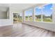 Bright living area with sliding glass doors, large windows and views to exterior at 304 Catheys Creek Cir, Wendell, NC 27591