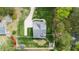 Aerial view of the home showcasing the expansive lot, long driveway, and backyard patio area at 321 Third Ave, Knightdale, NC 27545