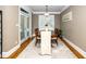 Inviting dining room with modern chandelier and natural light, ideal for Gathering dinners at 321 Third Ave, Knightdale, NC 27545