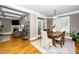 Bright open dining area with access to Gathering room offers the perfect flow for entertaining at 321 Third Ave, Knightdale, NC 27545