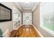 Bright and spacious foyer with hardwood floors, elegant trim, and a welcoming atmosphere at 321 Third Ave, Knightdale, NC 27545