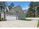 Spacious two-car garage with an extended driveway and well-kept backyard at 321 Third Ave, Knightdale, NC 27545