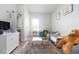 This adorable bedroom has light grey walls and luxury vinyl floors at 323 W 5Th St, Burlington, NC 27215