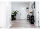 Beautiful hallway with luxury vinyl floors and decor at 323 W 5Th St, Burlington, NC 27215