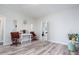 Bright office featuring luxury vinyl floors, white walls, a work space, and lovely decor at 323 W 5Th St, Burlington, NC 27215