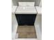 Explore elegant navy cabinets paired with light counters, backsplash, and Luxury Vinyl flooring for your new home at 324 White Oak Garden Way # 219, Garner, NC 27529