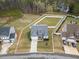 Aerial view of home with property lines, showcasing the large backyard at 358 Ashpole Trl, Clayton, NC 27520