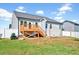 Spacious backyard with a deck and plenty of space for outdoor activities at 358 Ashpole Trl, Clayton, NC 27520