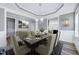 Elegant dining room with chandelier and decorative artwork at 358 Ashpole Trl, Clayton, NC 27520