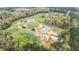 A stunning aerial view of the property and surrounding landscape at 3880 L Lawrence Trl, Graham, NC 27253