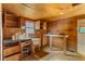 Rustic interior of barn with sink and storage at 3880 L Lawrence Trl, Graham, NC 27253