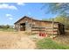 Barn exterior featuring dirt lot and surrounding trees at 3880 L Lawrence Trl, Graham, NC 27253