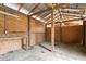 Barn interior with open wooden beam ceiling, concrete flooring, and natural light at 3880 L Lawrence Trl, Graham, NC 27253
