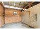 Empty horse stall interior with wooden walls and a hay rack at 3880 L Lawrence Trl, Graham, NC 27253