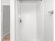 All-white tiled shower stall with chrome hardware at 3880 L Lawrence Trl, Graham, NC 27253