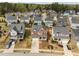 Neighborhood aerial view showcases the colorfully painted homes at 3914 Glorybower Way, Apex, NC 27502