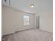 Neutral bedroom with carpet, window, and ensuite access at 3914 Glorybower Way, Apex, NC 27502