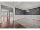 An open dining area with elegant light fixtures and wallpaper, creating a sophisticated ambiance at 3914 Glorybower Way, Apex, NC 27502