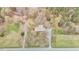 Aerial view of a home on a large lot surrounded by trees, showcasing privacy at 4018 Moon Lindley Rd, Snow Camp, NC 27349